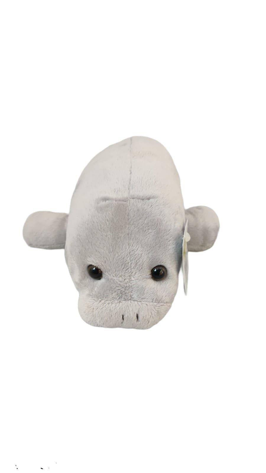 Manatee Plush Toy On An Extendable Red Leash